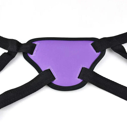 Adjustable purple leather strap-on harness for adult use.