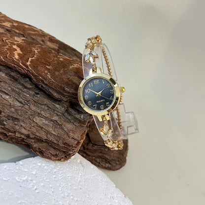 Round alloy case Arabic numeral classic dial leaf-shaped diamond-encrusted fashionable bracelet elegant ladies quartz watch Good Vibrations Adult Super Store