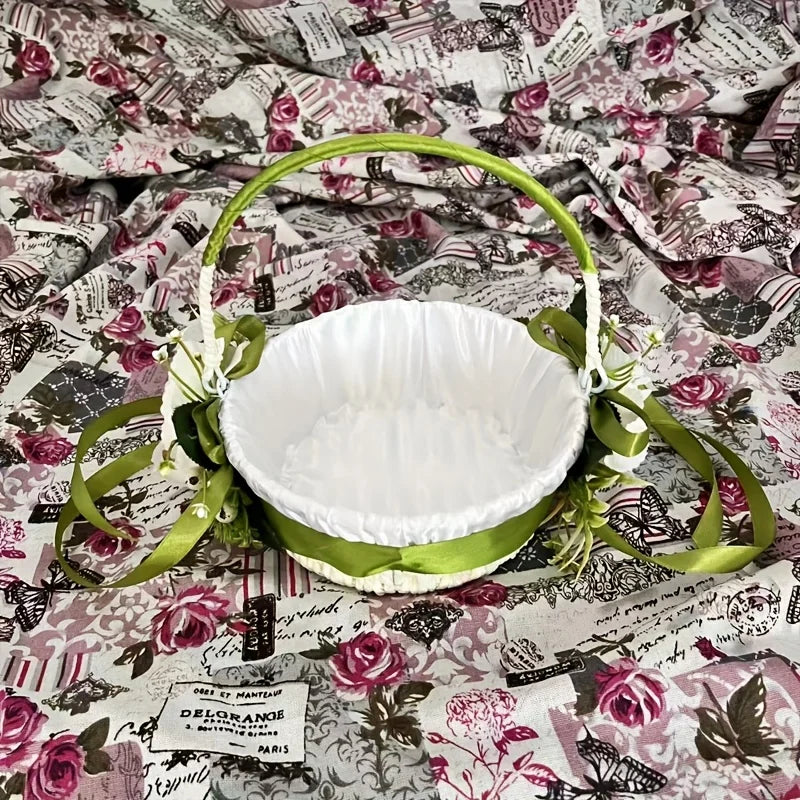 Elegant country-style wedding flower girl basket, decorated with green leaves and bows, suitable for ceremonies and photography Good Vibrations