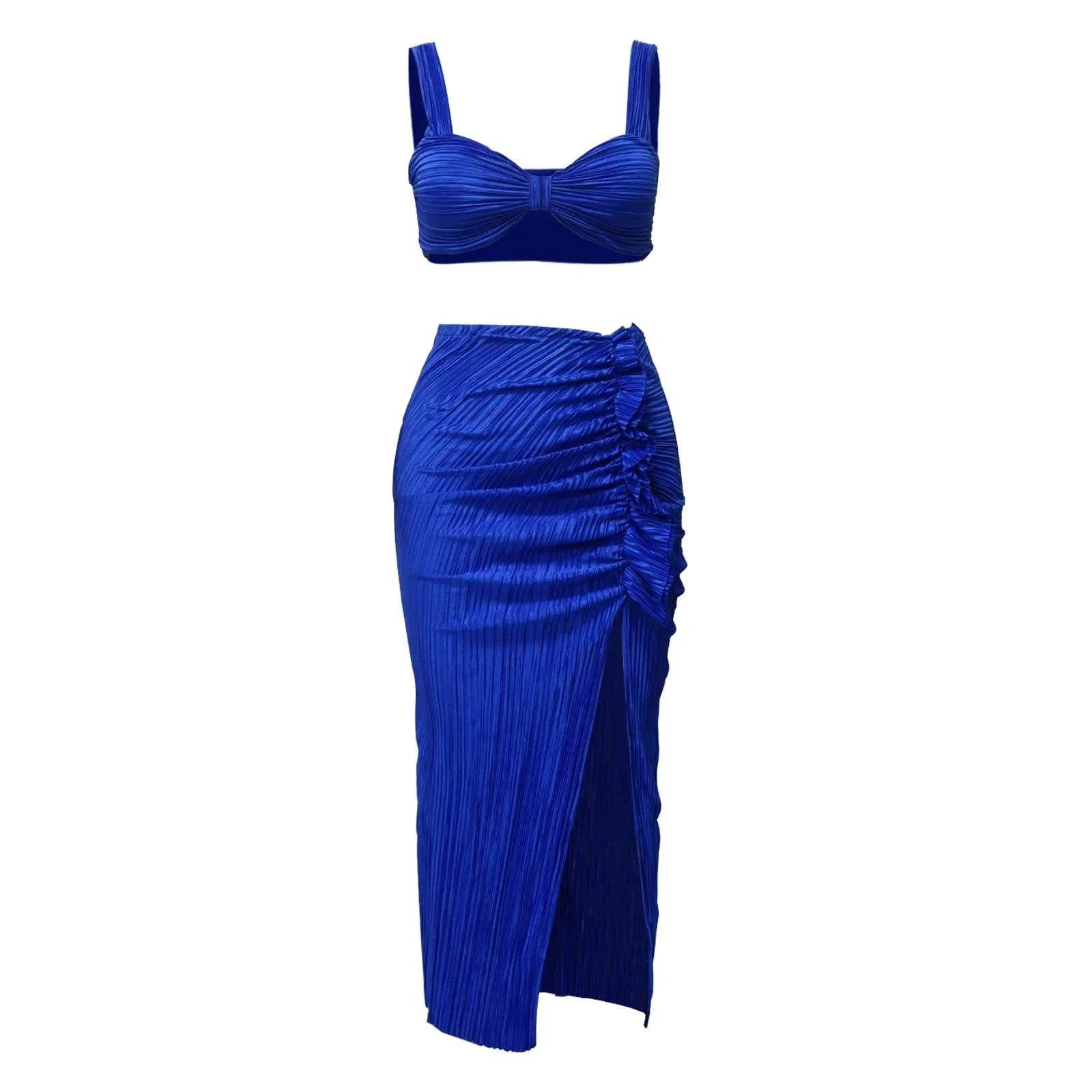 Summer two-piece set featuring a sexy backless halter top and high waist side slit pleated skirt in vibrant blue.