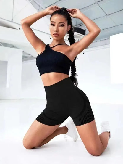 Black high-waist seamless women yoga shorts made of polyester, nylon, and spandex, ideal for fitness and running.