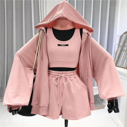 Pink women's super soft polyester sports jacket set with hooded coat, drawstring shorts, and matching vest