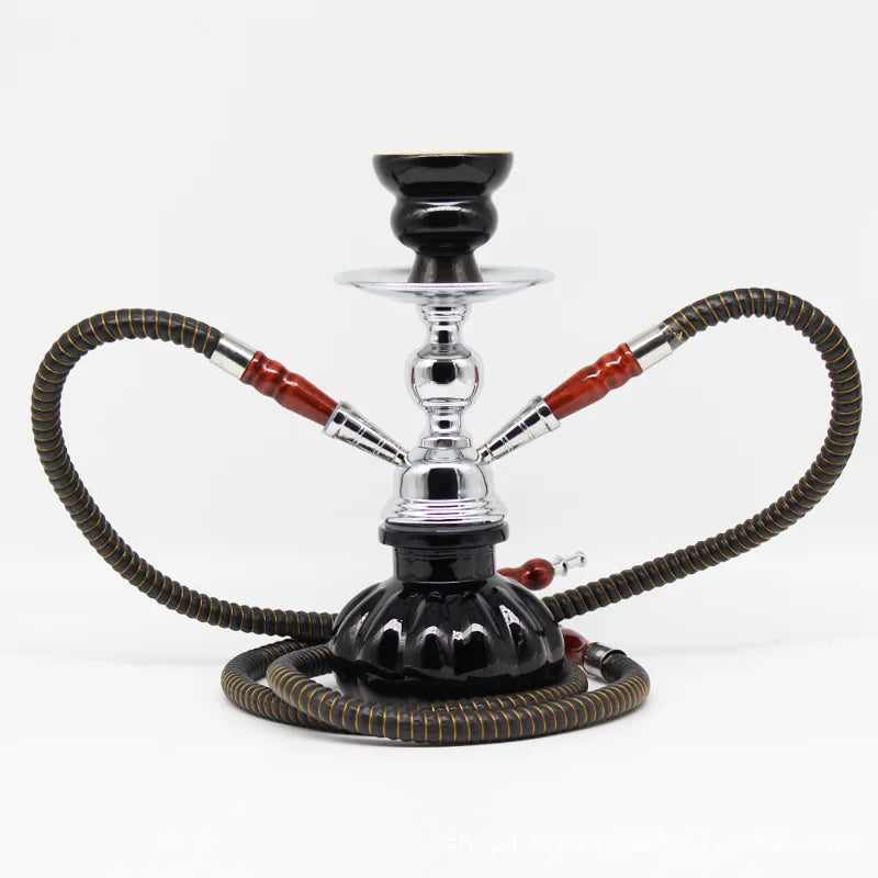 Small Glass Shisha Pipe Hookah Set with hose and bowl on white background.