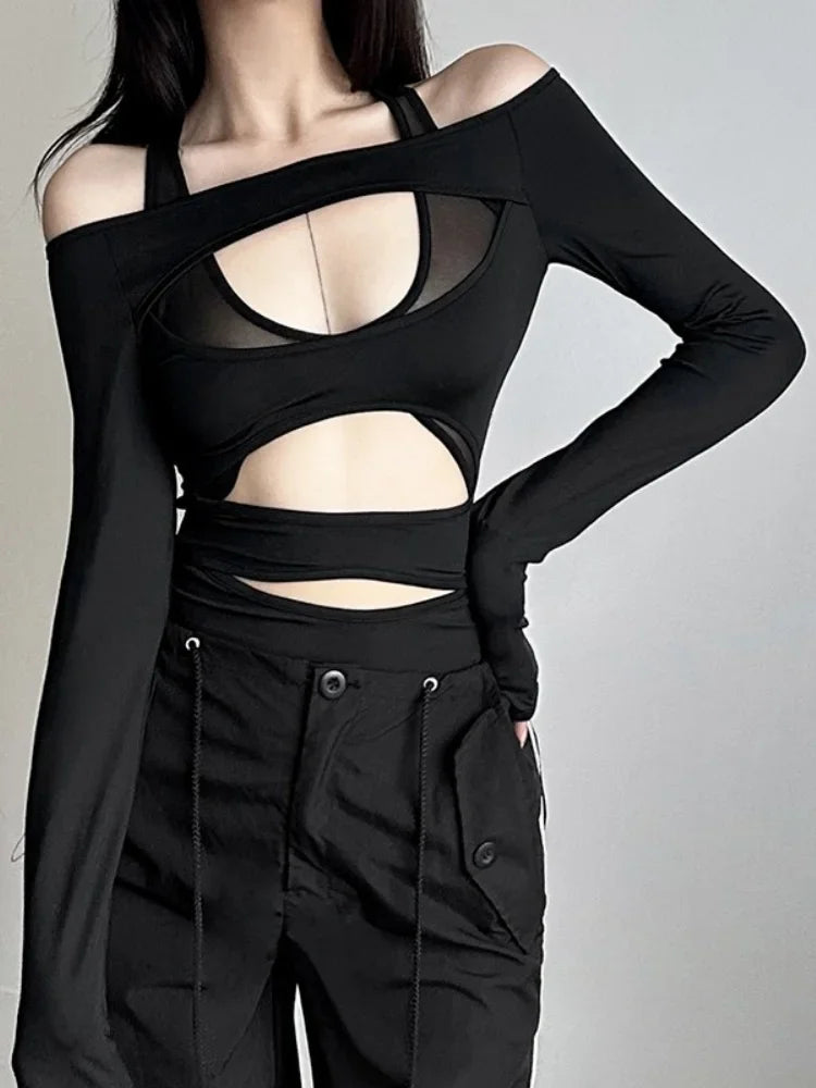 Hollow out sexy bodysuit lingerie in solid black with long sleeves, suitable for club or rave.