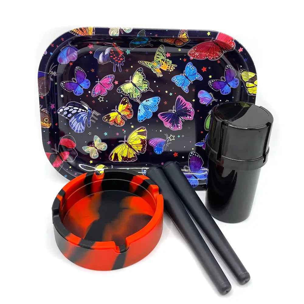 Cigarette plastic herb grinder set with butterfly tray, red ashtray, black storage tube, and tools.