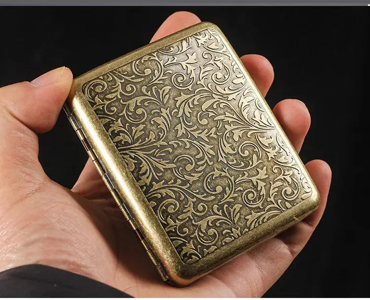 Retro Brass Cigarette Box with Ornate Design in Hand