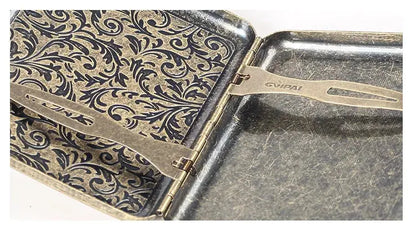 Retro brass cigarette box with intricate frosted design and secure closure mechanism.