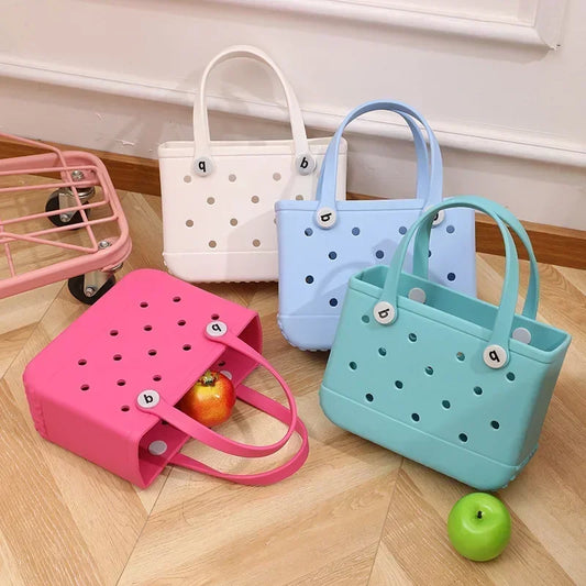 Colorful EVA waterproof summer storage tote bags with perforated design for beach and shopping use