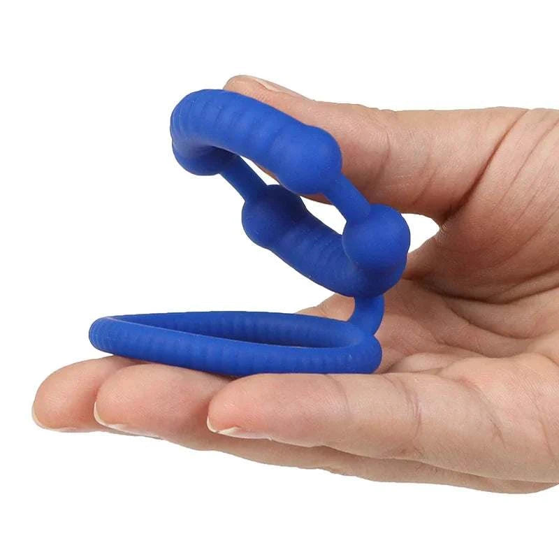 Semen Lock Ring Male Masturbator in blue silicone for delayed ejaculation.