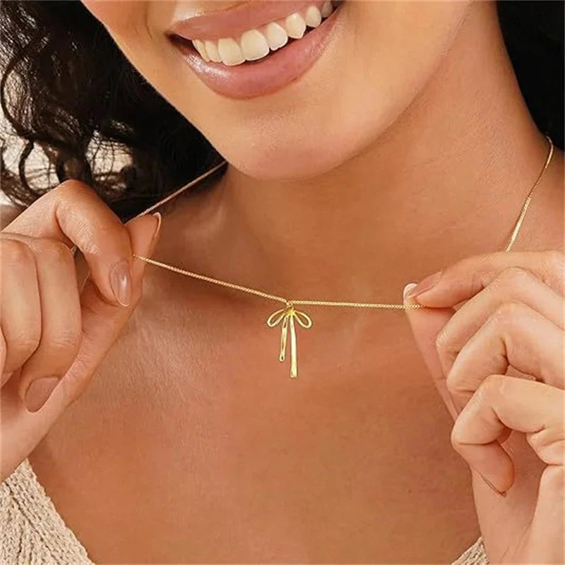 Simple Elegant Cross Bow Necklace for Women Attractive Motifs Golden Alloy Layered Necklace Party Jewellery Accessories Good Vibrations