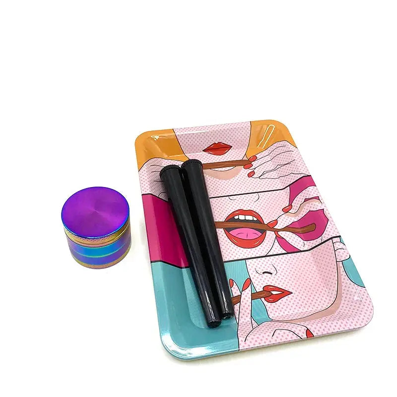 Metal herb grinder set with colorful rolling tray and black storage tube.