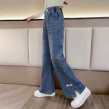 New 2024 Teenage Girls Blue Street Cartoon Print Elastic Mid Waist Loose Denim Jeans Spring Fashion Children Cute Wide Leg Pants Good Vibrations