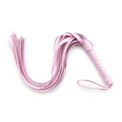 Pink leather BDSM whip for erotic accessories and bondage games.