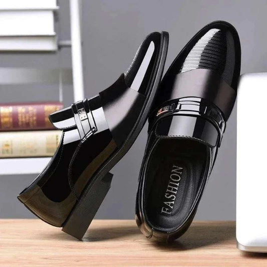 Black men's formal leather slip-on shoes with shiny finish and rubber sole, minimalist design for business and casual wear