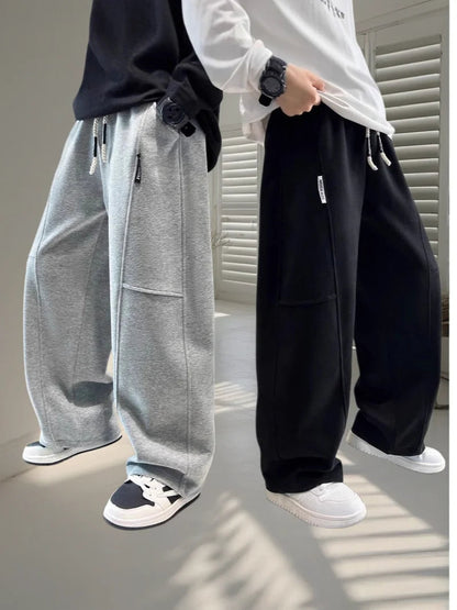 2026 New Spring Casual Kids Pants Black Elastic Waist Straight Leg Sweatpants for Boys Loose Pocket Children Trousers Good Vibrations
