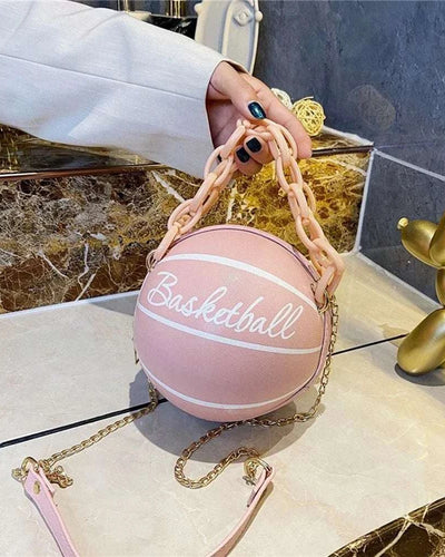 Pink round basketball-shaped women's crossbody bag with thick chain and soft PU leather material