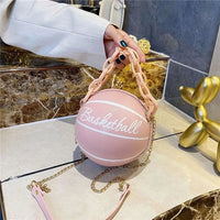 Pink round basketball-shaped women's crossbody bag with thick chain and soft PU leather material