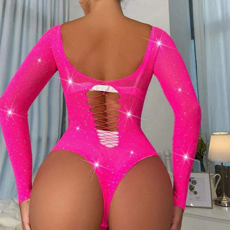 Women’s pink rhinestone bodysuit with long sleeves and hollow back design.