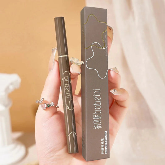 Slim waterproof brown eyeliner liquid pen with fine tip and long-lasting formula