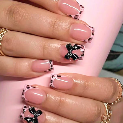 24Pcs Pink Leopard Print French Tips False Nails Short Square Head 3D Black Bowknot Fake Nails Acrylic Full Cover Press on Nails Good Vibrations