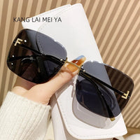 2025 New Metal Frameless Sunglasses Women's European and American Trendy Glasses Good Vibrations