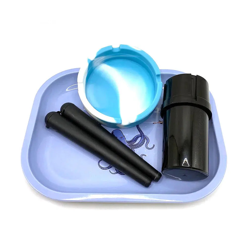 Cigarette plastic herb grinder set with silicone ashtray, metal rolling tray, and storage tube.