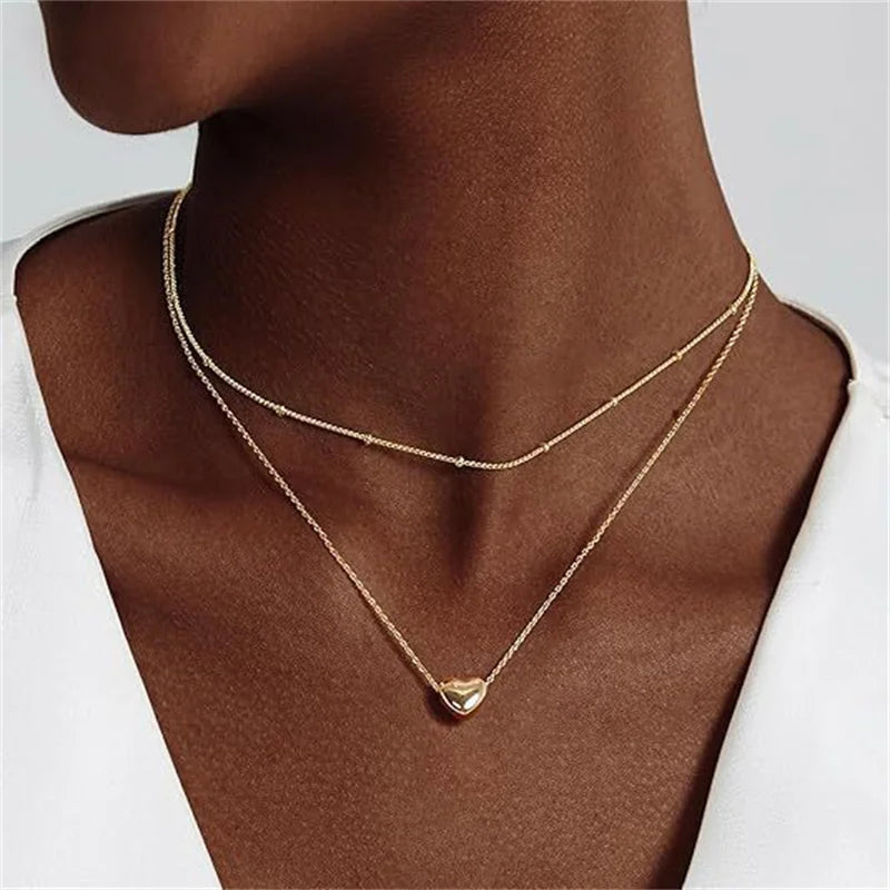 Simple Elegant Cross Bow Necklace for Women Attractive Motifs Golden Alloy Layered Necklace Party Jewellery Accessories Good Vibrations