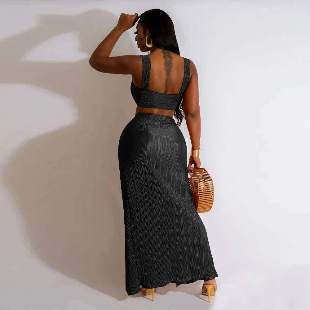 Backless halter top and high waist side slit pleated skirt set for women, perfect for summer beach streetwear.