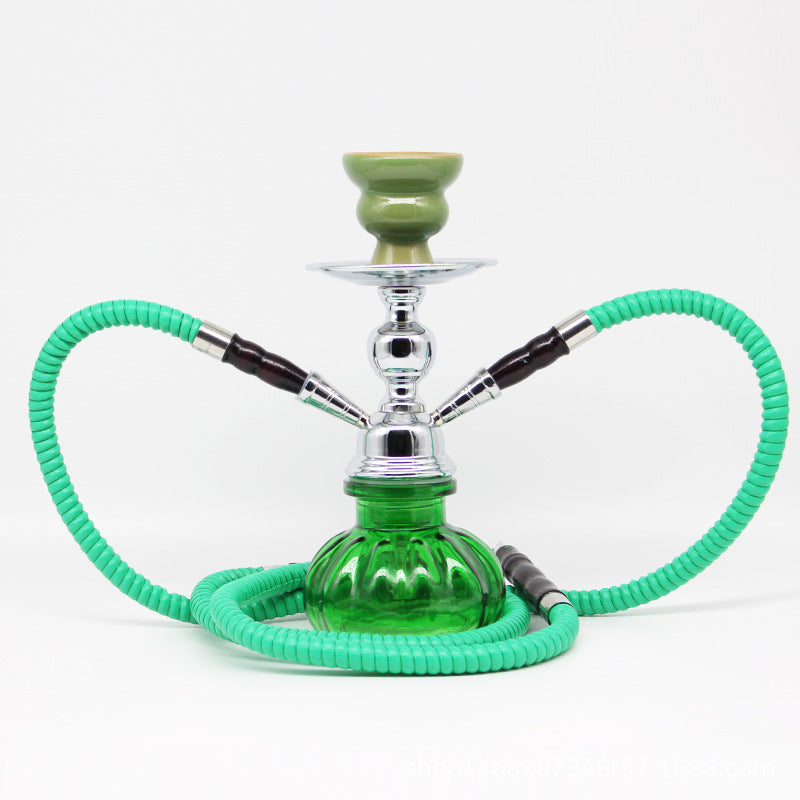 Small glass shisha pipe hookah set with green hose and bowl.