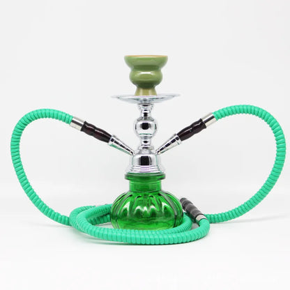 Small glass shisha pipe hookah set with green glass base and hose.