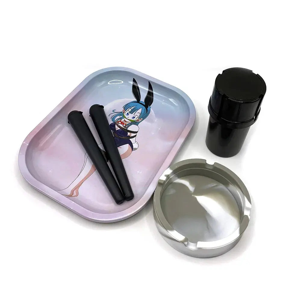 Cigarette plastic herb grinder set with metal rolling tray and silicone ashtray.