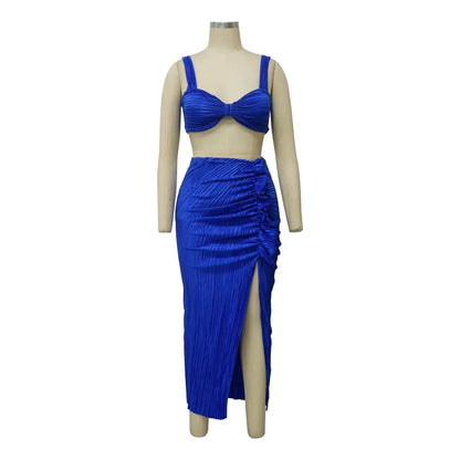 Summer two-piece set with a backless halter top and high waist side slit pleated skirt in blue, stylish streetwear.
