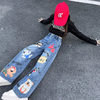 New 2024 Teenage Girls Blue Street Cartoon Print Elastic Mid Waist Loose Denim Jeans Spring Fashion Children Cute Wide Leg Pants Good Vibrations