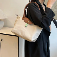 2025 Classic Commuter Handbag for Women Elegant Leather Large Capacity Business Trendy with Solid Color Paris Style Good Vibrations