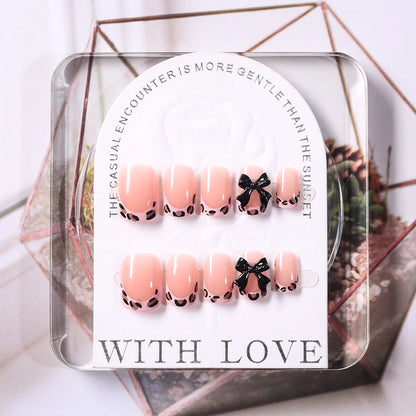 24Pcs Pink Leopard Print French Tips False Nails Short Square Head 3D Black Bowknot Fake Nails Acrylic Full Cover Press on Nails Good Vibrations