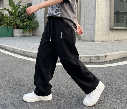 2026 New Spring Casual Kids Pants Black Elastic Waist Straight Leg Sweatpants for Boys Loose Pocket Children Trousers Good Vibrations