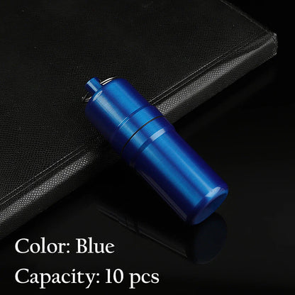 Blue metal cigarette case with keychain, waterproof, holds 10 cigarettes, portable for travel.