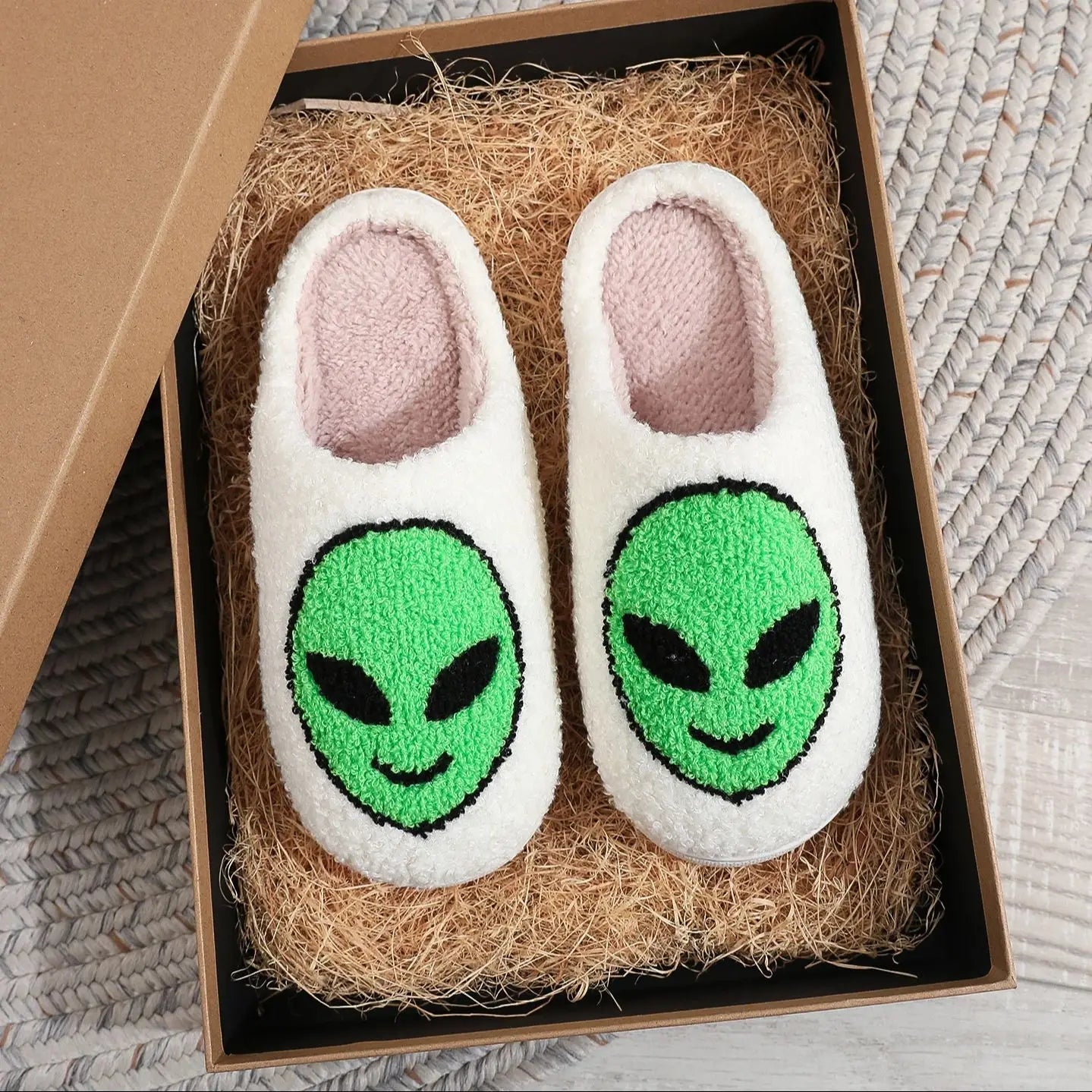 A pair of alien patterned winter home cotton slippers non-slip thick-soled wool slippers comfortable indoor shoes for men and women can wear Good Vibrations