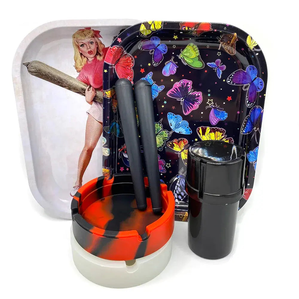 Cigarette plastic herb grinder set with silicone ashtray, metal rolling tray, and storage tube.