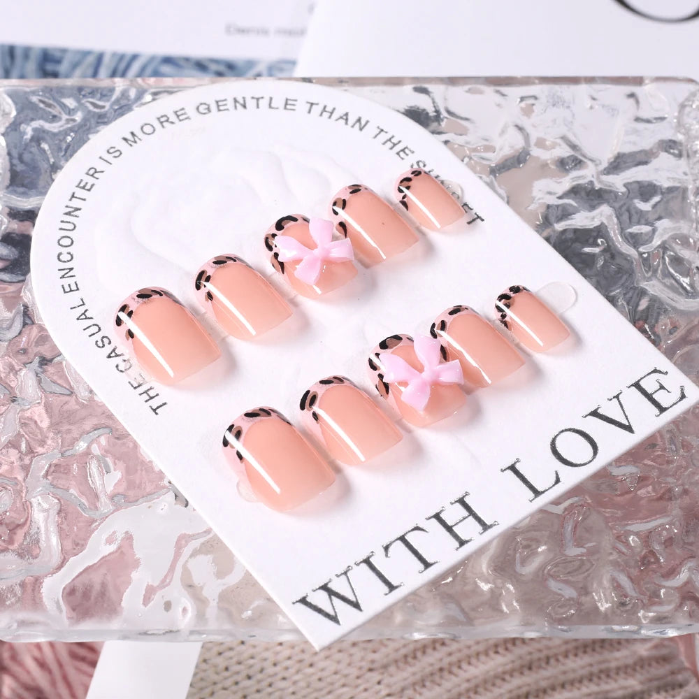 24Pcs Pink Leopard Print French Tips False Nails Short Square Head 3D Black Bowknot Fake Nails Acrylic Full Cover Press on Nails Good Vibrations