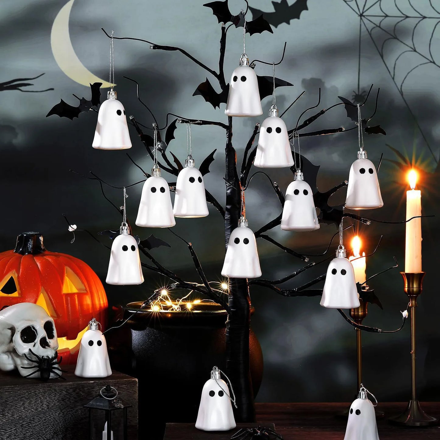 Halloween hanging ghost ornaments on black decorative tree with Halloween decor background