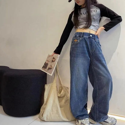 New 2024 Teenage Girls Blue Street Cartoon Print Elastic Mid Waist Loose Denim Jeans Spring Fashion Children Cute Wide Leg Pants Good Vibrations