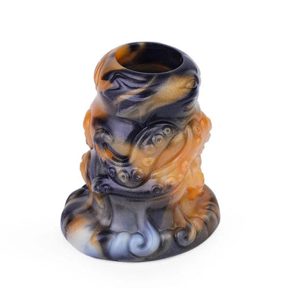 Multi-color QAAI Hollow Anal Expander in liquid silicone for prostate massage.