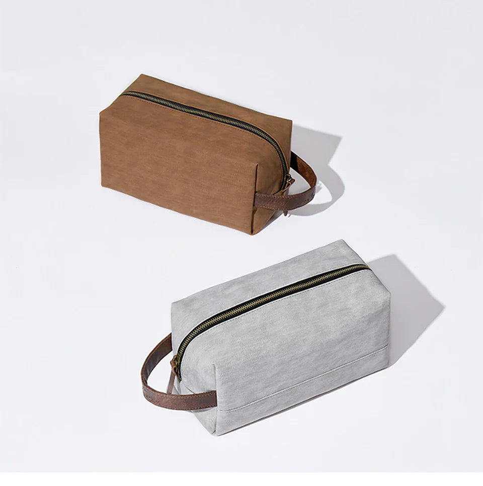 Portable hookah bags in brown and gray color with zipper and handle for toiletries and travel essentials.