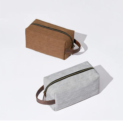 Portable hookah bags in brown and gray color with zipper and handle for toiletries and travel essentials.