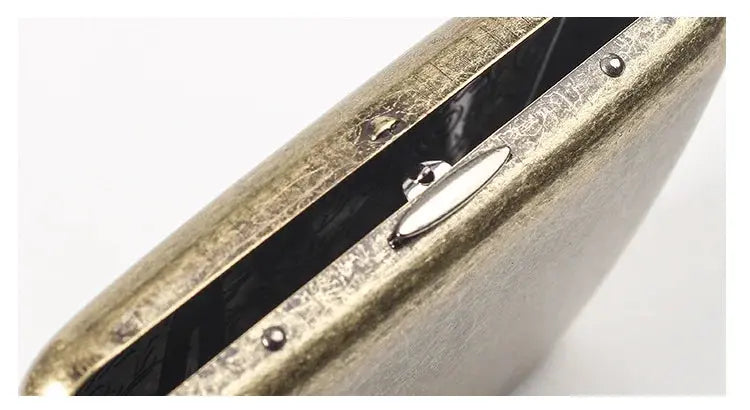 Retro brass cigarette box with frosted finish and clasp closure, perfect for tobacco storage.