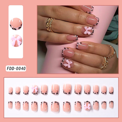 24Pcs Pink Leopard Print French Tips False Nails Short Square Head 3D Black Bowknot Fake Nails Acrylic Full Cover Press on Nails Good Vibrations