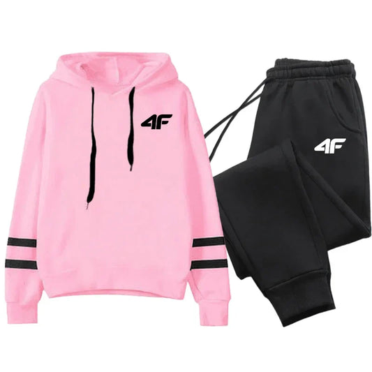 Women's tracksuit hoodies set with pink pullover hoodie and black sweatpants featuring stripe design and 4F logo for casual sportswear