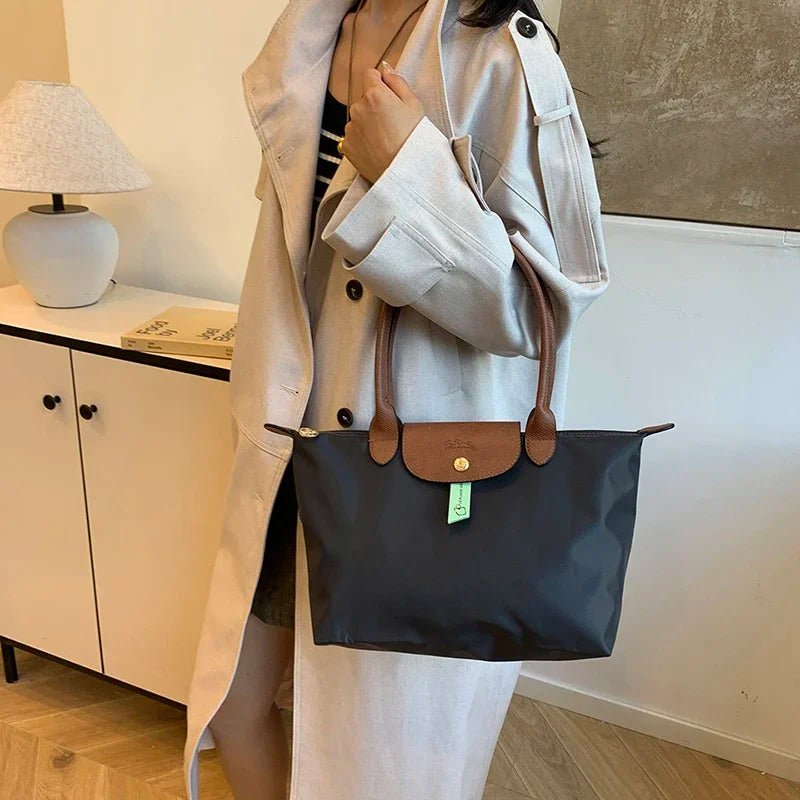 2025 Classic Commuter Handbag for Women Elegant Leather Large Capacity Business Trendy with Solid Color Paris Style Good Vibrations