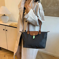 2025 Classic Commuter Handbag for Women Elegant Leather Large Capacity Business Trendy with Solid Color Paris Style Good Vibrations